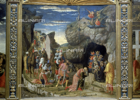 AGC-F-000588-0000 - Central panel with 'The adoration of the Magi' of the famous Triptych by Andrea Mantegna in the Uffizi Gallery in Florence. The kings, come from the East with their precious gifts, are devoutly bowing before the child and the Virgin, shown on the threshold of a grotto. The royal procession following the Magi is winding along against a rugged rocky landscape in the background - Date of photography: 1992 - Reproduced with the permission of Ministero della Cultura / Alinari Archives, Florence