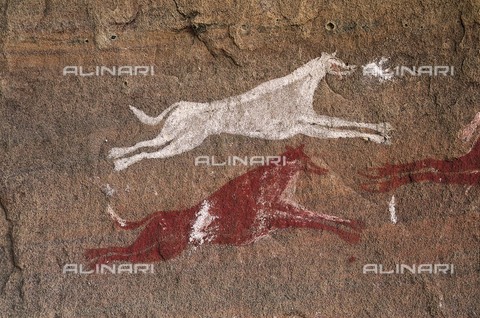AIS-F-088863-0000 - LIBYA. Tadrart Acacus. Representation of dogs (1500 BC). Neolithic art. Cave. - Vannini / Iberfoto/Archivi Alinari