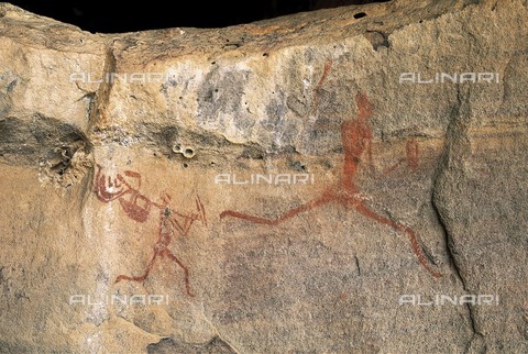AIS-F-088864-0000 - LIBYA. Tadrart Acacus. Hunting scene (12.000-8000 BC). Neolithic art. Cave. - Vannini / Iberfoto/Archivi Alinari