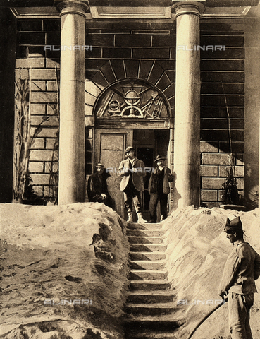 AVQ-A-000007-0018 - A few men, at the entrance of the Vesuvian Observatory, observe ash deposited by the 1906 eruption. - Date of photography: 1906 - Alinari Archives, Florence