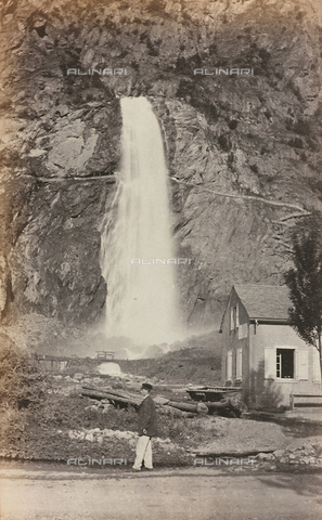 AVQ-A-000012-0004 - A man photographed in front of the Falls of Pissevache (Cascade de Pissevache) - Date of photography: 1860-1880 - Alinari Archives, Florence