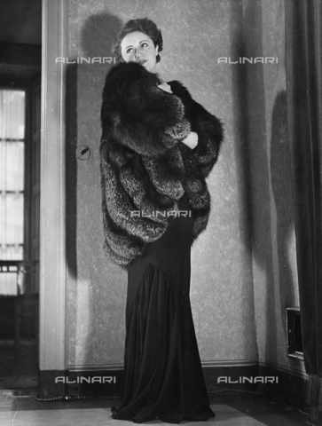 AVQ-A-000029-0001 - Model wearing a tailored fur coat, San Lorenzo-Torino, fashion event in Sanremo - Date of photography: 16-17/01/1937 - Alinari Archives, Florence