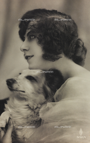 AVQ-A-000047-0071 - Portrait of a young woman with a dog, postcard - Date of photography: 1910-1920 - Alinari Archives, Florence