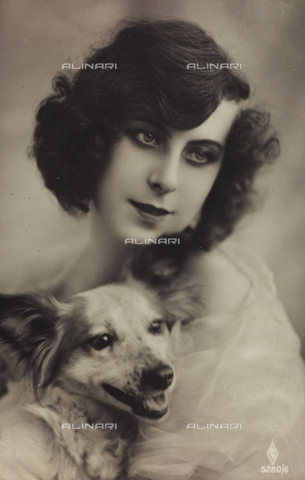 AVQ-A-000047-0075 - Portrait of a young woman with a dog, postcard - Date of photography: 1910-1920 - Alinari Archives, Florence