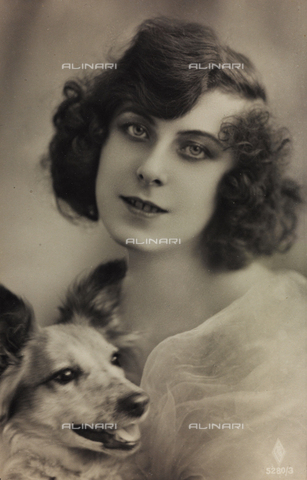 AVQ-A-000047-0076 - Portrait of a young woman with a dog, postcard - Date of photography: 1910-1920 - Alinari Archives, Florence