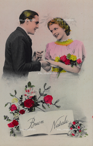AVQ-A-000047-0154 - Christmas card with a man and woman holding hands - Date of photography: 1910-1920 - Alinari Archives, Florence