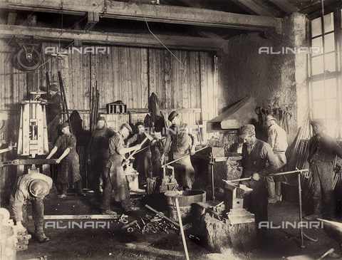 AVQ-A-001321-0016 - Construction of Worcheiner Tunnels, begun in 1897. The tunnel connected the general plan to Trieste. The image shows a group of blacksmiths at work. The album was commissioned by the Friulian entrepreneur Giacomo Ceconi from Montececon - Date of photography: 1905 ca. - Alinari Archives, Florence
