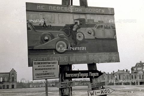 AVQ-A-001479-0070 - Roadsigns in German set next to other signs in Cyrillic in a town in White Russia during the offensive campaign of 1942-43 - Date of photography: 02-03/1943 - Alinari Archives, Florence