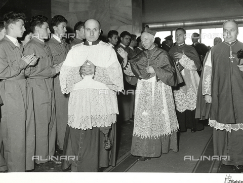 AVQ-A-002364-0018 - XIV National Eucharistic Congress of Turin: Arrival of Cardinal liaison Ildefonso Schuster at F.I.A.T. Mirafiori - Date of photography: 12/09/1953 - Alinari Archives, Florence