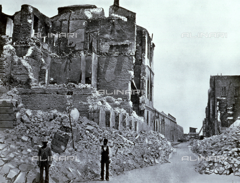 AVQ-A-002695-0015 - A street in Alexandria, Egypt, seriously damaged by the English shellings of 1882. In the foreground, on the left, two men are posing in front of the rubble of the French Consulate - Date of photography: 1882 - Alinari Archives, Florence