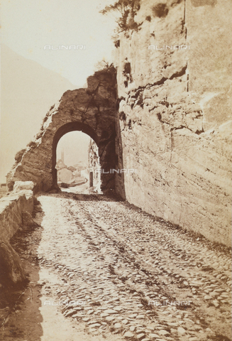 AVQ-A-002868-0002 - The ancient Roman road in Donnaz with a natural arch used as a passageway, Valle d'Aosta - Date of photography: 1865 - 1868 - Alinari Archives, Florence