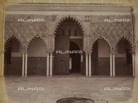 AVQ-A-003897-0011 - Side view of the patio of Las Doncellas in the Alcazar of Seville, with the entrance to the Salon de Embajadores - Date of photography: 1880 - 1890 - Alinari Archives, Florence