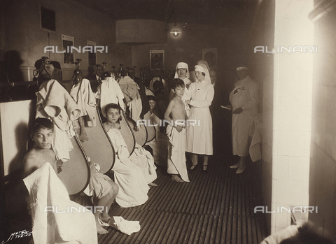 AVQ-A-004562-0003 - Album "School Giacinto Pacchiotti, photographs taken during the visit of HRH Princess Lydia Duchess of Pistoia": group photo with the princess during the visit to children - Date of photography: 20/11/1929 - Alinari Archives, Florence
