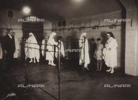 AVQ-A-004562-0005 - Album "School Giacinto Pacchiotti, photographs taken during the visit of HRH Princess Lydia Duchess of Pistoia": the princess during the visit to children - Date of photography: 20/11/1929 - Alinari Archives, Florence