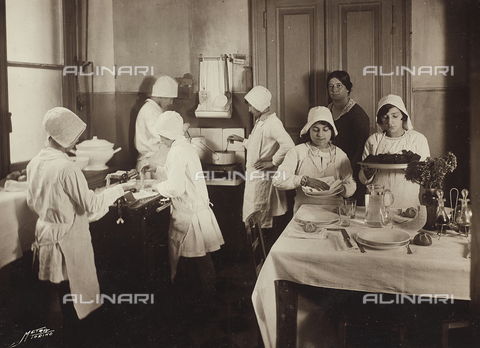 AVQ-A-004562-0006 - Album "School Giacinto Pacchiotti, photographs taken during the visit of HRH Princess Lydia Duchess of Pistoia": girls cooking school - Date of photography: 20/11/1929 - Alinari Archives, Florence