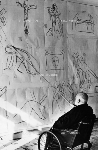 BPK-S-AA1001-3734 - Henri Matisse (1869-1954) dipinge su una sedia a rotelle, Vence - Data dello scatto: 1951 - Felix H. Man / BPK/Archivi Alinari