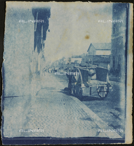 FBQ-F-001251-0000 - View of a street: in the foreground, a wagon drawn up alongside the sidewalk - Date of photography: 1882 - 1887 - Alinari Archives, Florence