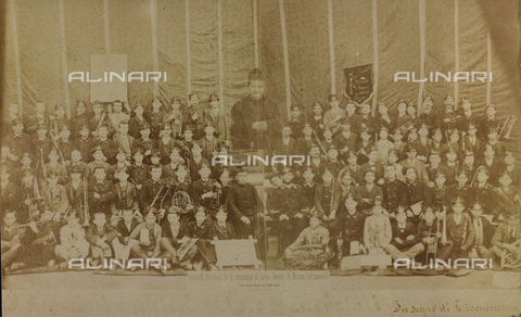 FBQ-F-006001-0000 - Portrait of a large group of pupils of the music school of the Oratory of San Francesco di Sales, in Turin. Seated among the young students is a priest - Date of photography: 1891 ca. - Alinari Archives, Florence