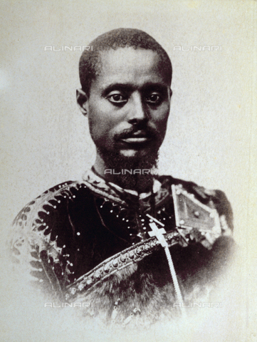 FBQ-S-000567-0001 - Half-length portrait of a dark-skinned man (probably Somali or Eritrean). He is wearing a jacket with a mandarin collar and decorations in fur - Date of photography: 1870 - 1880 ca. - Alinari Archives, Florence