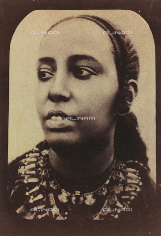 FBQ-S-000567-0002 - Close-up of a young African woman (Eritrea or Somalia). She is wearing numerous necklaces - Date of photography: 1870 - 1880 ca. - Alinari Archives, Florence