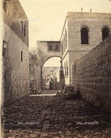 FCC-F-022667-0000 - The Arch of the Ecce Homo, on the Via Dolorosa in Jerusalem, Israel. Today it is seen as a semi-arch, but it is only a portion of the three-vaulted arch built in the Hadrian era, after 135 A.D.. It served as an entrance to the city from the north-west side. The arch is found near the Convent of the Flagellation - Date of photography: 1870 - 1880 ca. - Alinari Archives, Florence
