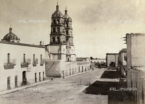 FVQ-F-141028-0000 - The main street of Durango, in Mexico. On the left the fine cathedral with its tall bell towers - Date of photography: 1863 - 1866 - Alinari Archives, Florence