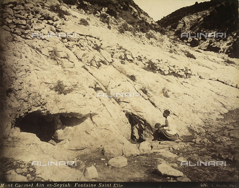 FVQ-F-198556-0000 - The fountain of Sant'Elia on Mount Carmelo, Israel. A man is sitting near the fountain - Date of photography: 1880 ca. - Alinari Archives, Florence