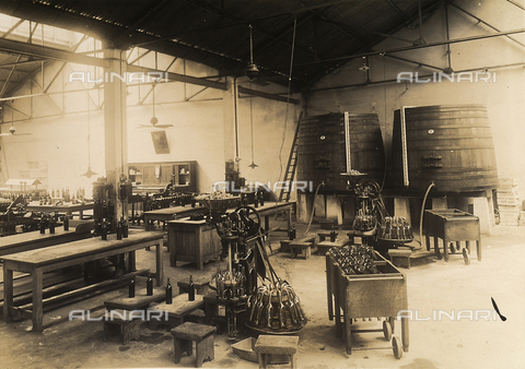 GCQ-F-006479-0000 - Francesco Cinzano & Company, Buenos Aires: bottling department - Date of photography: 1920 -1925 ca. - Alinari Archives, Florence