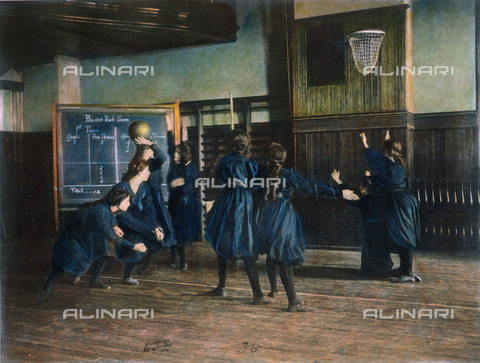 GRC-F-057471-0000 - GIRLS PLAYING BASKETBALL in Western High School, Washington, D.C. Oil over a photograph, 1899, by Frances Benjamin Johnston. - Granger, NYC/Alinari Archives