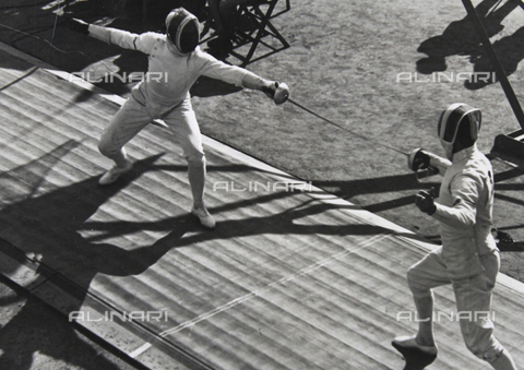 IMA-F-641959-0000 - Giochi Olimpici di Berlino (IX Olimpiade), 1936: gara di scherma - Data dello scatto: 01/08/1936 - brandstaetter images /Archivi Alinari