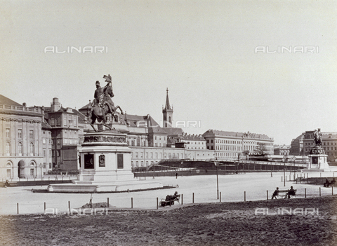 MFC-A-004636-0004 - Heldenplatz, dedicated to the heroes, exterior courtyard of the Hofburg, the Royal Palace in Vienna. In the foreground the statue of the archduke Karl, in the distance that of Eugene of Savoy. In the background view of the palace - Date of photography: 1875-1880 ca. - Alinari Archives, Florence