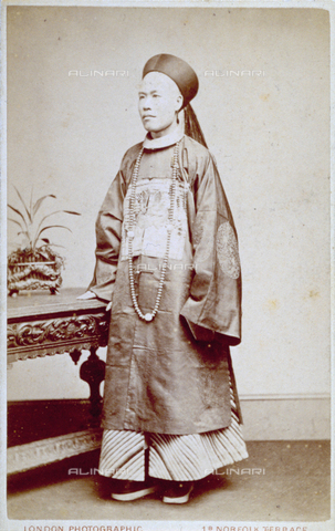 MFC-F-001202-0000 - Full-length portrait of a young asian man in traditional dress - Date of photography: 1870 ca. - Alinari Archives, Florence