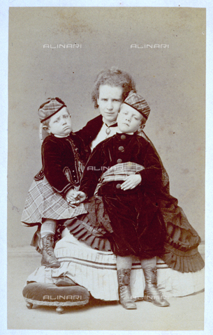 MFC-F-001904-0000 - Portrait of a young woman with children. She is wearing a full skirt - Date of photography: 1865-1871 ca. - Alinari Archives, Florence