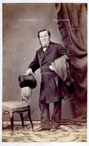 MFC-F-001924-0000 - Full-length portrait of the singer Antonio Tamburini. The man wears a frock coat and holds a top hat - Date of photography: 14/05/1864 - Alinari Archives, Florence