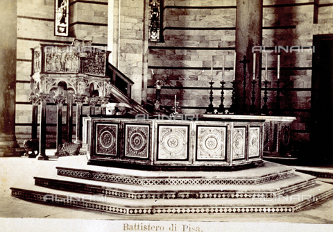 MFC-F-002165-0000 - Baptismal font in the Baptistry in Pisa. In the background the pulpit and a small altar with seven candelabra on it - Date of photography: 1870 ca. - Alinari Archives, Florence