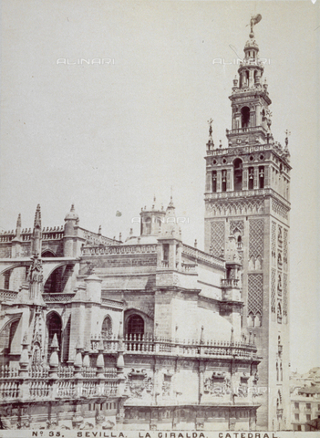 MFC-F-003184-0000 - The cathedral of Seville, and the Giralda, the adjacent minaret. Both buildings are decorated with pinnacles, spires, arches and mullioned windows - Date of photography: 1870-1880 - Alinari Archives, Florence