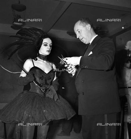 RVA-S-004447-0002 - Premiere of "Treize danses" ballet by Roland Petit at the Champs-Elysées theater in Paris on November 12, 1947: Christian Dior, costume designer and stage designer, photographed with French dancer Nathalie Philippart - Date of photography: 12/11/1947 - Roger Berson / Roger-Viollet/Alinari