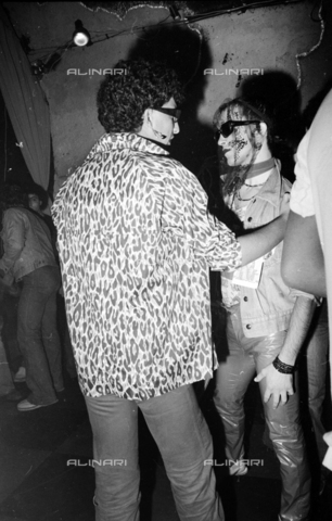 TEA-S-470217-B037 - "Punk" disguise at the Olimpo Club in Via Monte Testaccio, Rome - Date of photography: 15/10/1977 - Alinari Archives, Florence