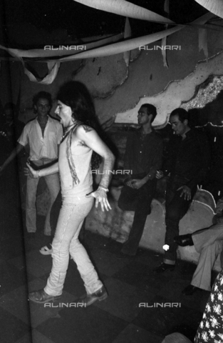 TEA-S-470218-B23B - Party at the Olimpo Club in Via Monte Testaccio, Rome - Date of photography: 01/10/1977 - Alinari Archives, Florence